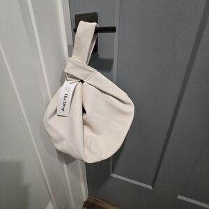 The Drop Elegant Cream Wristlet